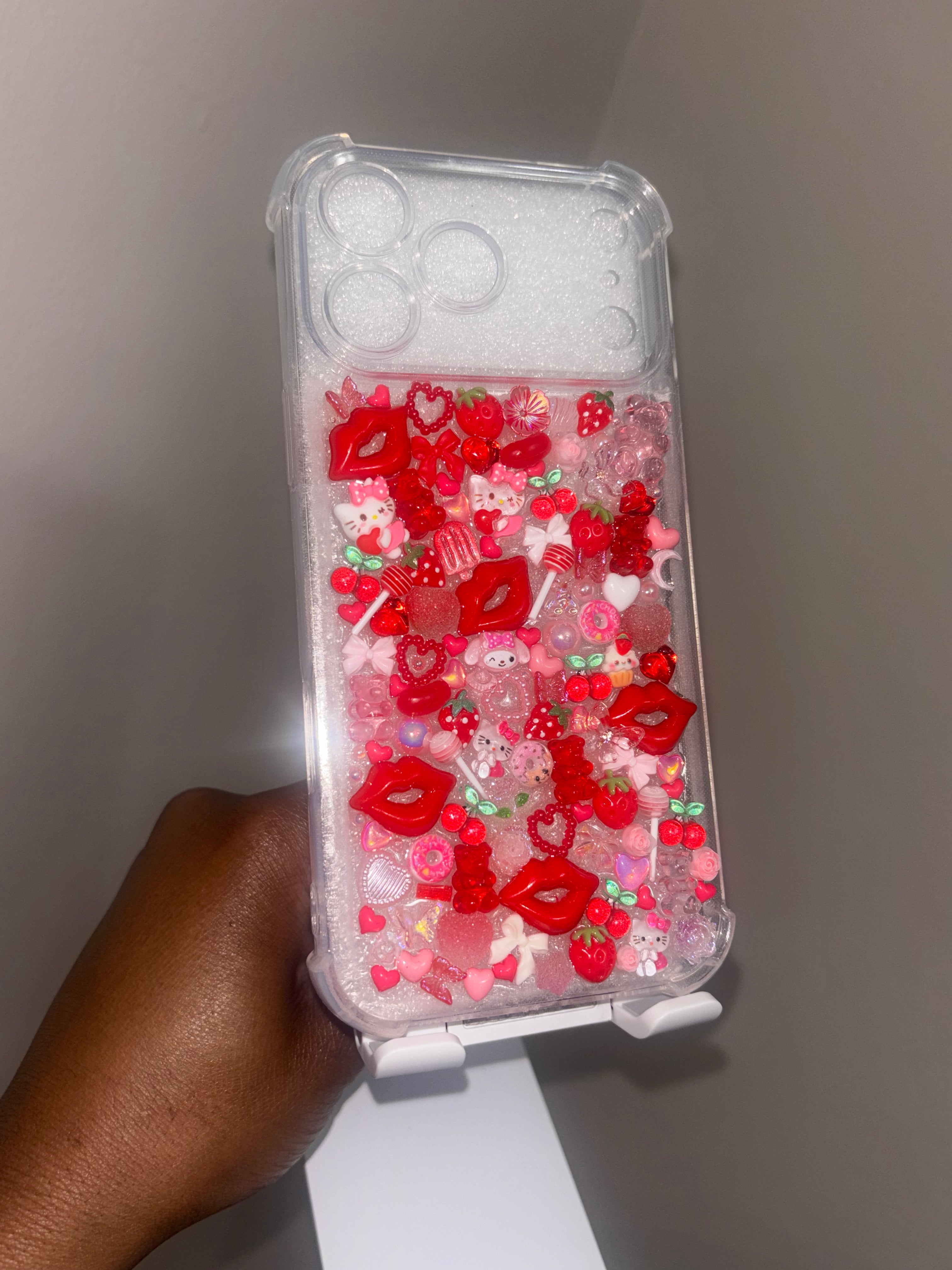 Hugs and Hello Kitty Kisses iPhone 17 Pro Max Junk Case