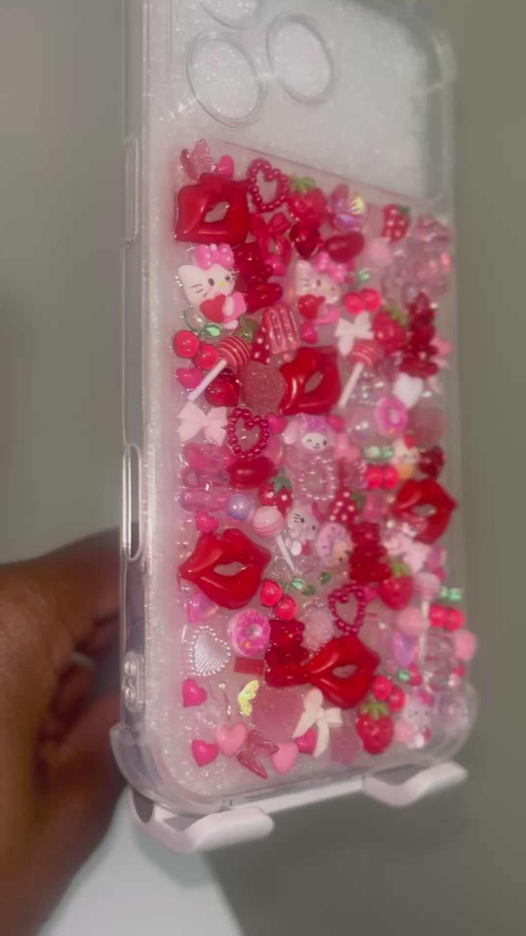 Hugs and Hello Kitty Kisses iPhone 17 Pro Max Junk Case